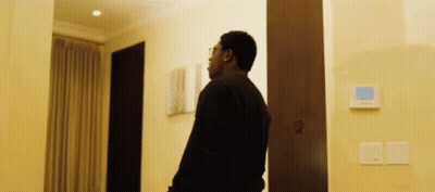 Man In Black Sweater Standing GIF