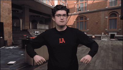 Man In Black Sweater With Ia Letter GIF