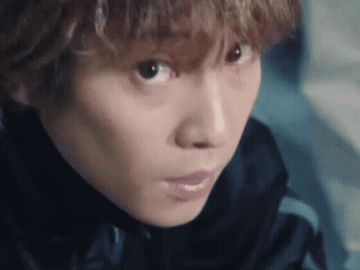Man In Black Sweater With Letter K3 GIF
