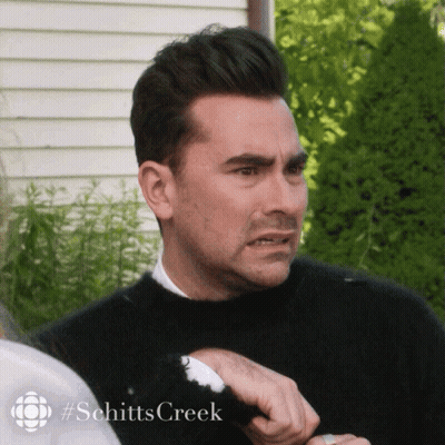 Man In Black Sweater With Schitt's Creek GIF