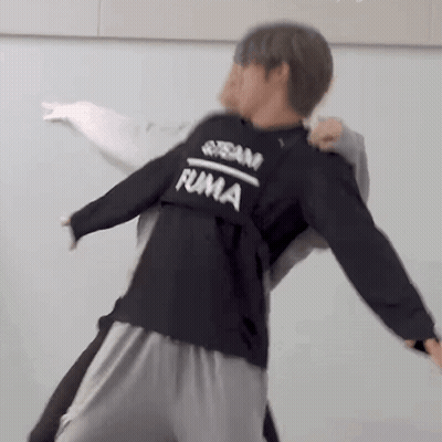 Man In Black Sweatshirt Holding Man In Grey Sweatshirt GIF