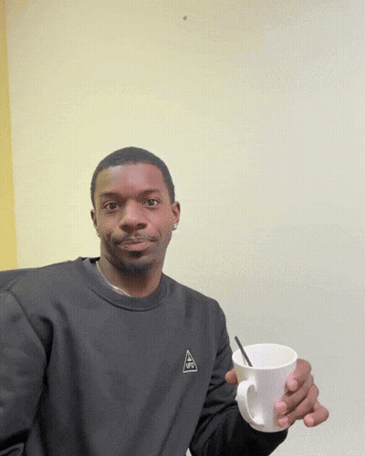 Man In Black Sweatshirt Pointing GIF