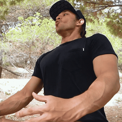 Man In Black T-Shirt And Hat With Letter T GIF