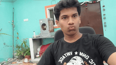 Man In Black T-Shirt Making Funny Face GIF