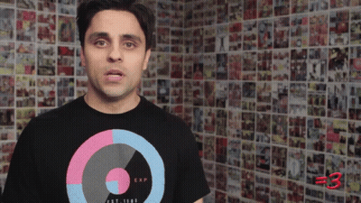 Man In Black T-Shirt Saying EXP GIF