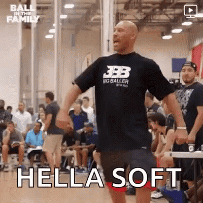 Man In Black T-Shirt Standing On Basketball Court With Arms Outstretched GIF