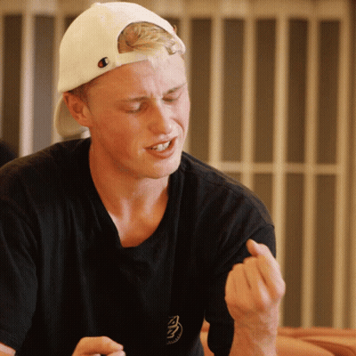 Man In Black T-Shirt, White Hat, Champion Logo GIF
