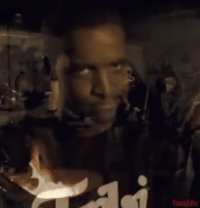 Man In Black T-Shirt With Letter J On Cell Phone GIF