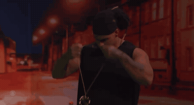 Man In Black Tank Top Adjusting Hat GIF