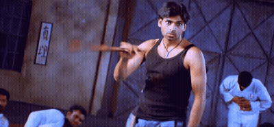 Man In Black Tank Top And Chinese Writing Wall GIF