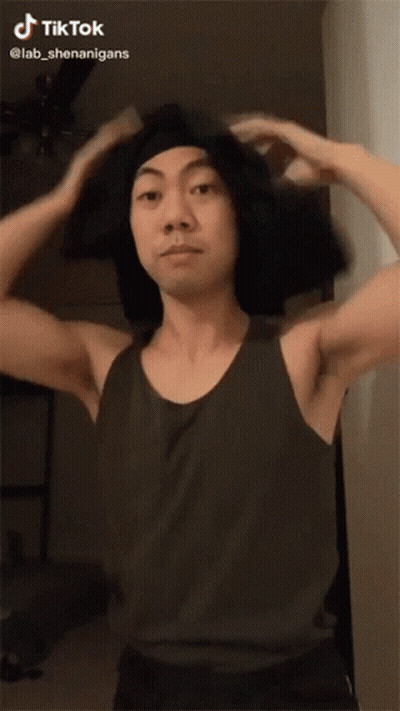 Man In Black Tank Top And Headband With TikTok Sticker GIF