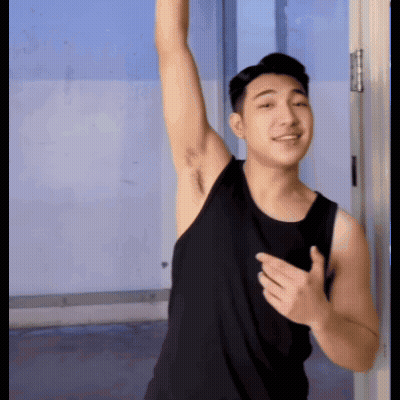 Man In Black Tank Top Arm Raised GIF