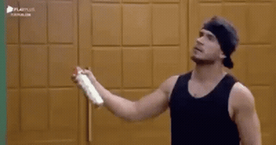 Man In Black Tank Top Holding Spray Can GIF