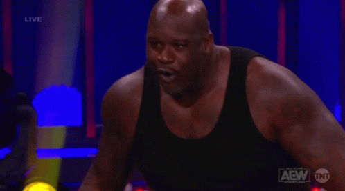 Man In Black Tank Top In Wrestling Ring GIF