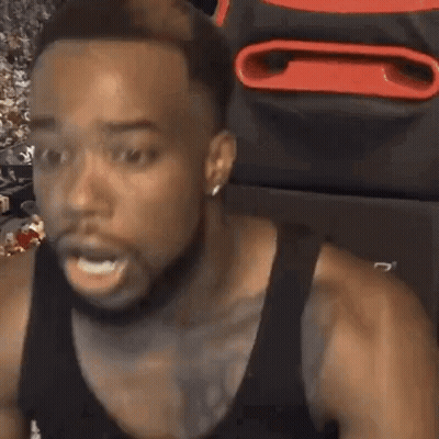 Man In Black Tank Top Making Funny Face GIF