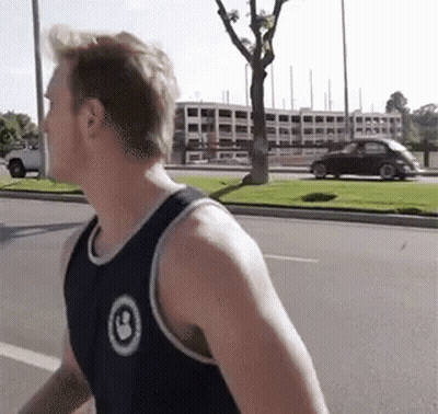 Man In Black Tank Top Number 8 Walking GIF