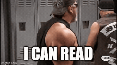 Man In Black Tank Top Reading GIF