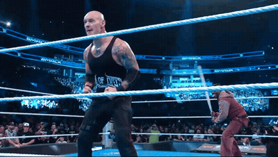 Man In Black Tank Top Saying Of Days In Wrestling Ring GIF