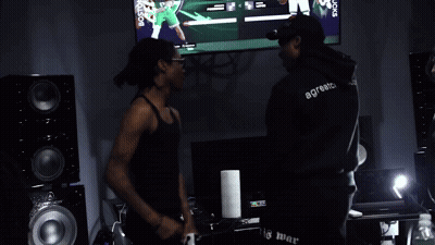 Man In Black Tank Top Saying S.com GIF