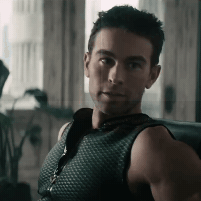 Man In Black Tank Top Sitting GIF