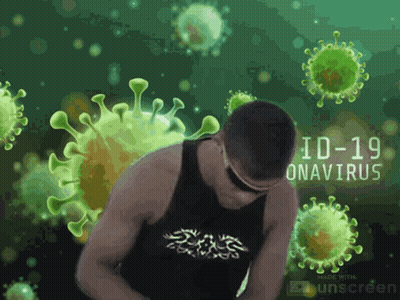 Man In Black Tank Top Surrounded By Green Viruses GIF