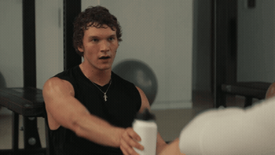 Man In Black Tank Top With Cross Necklace GIF