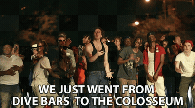 Man In Black Tank Top With Crowd GIF