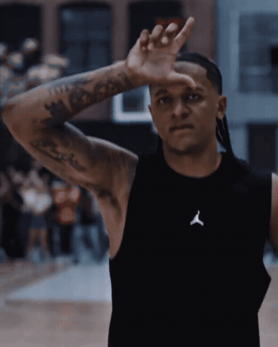 Man In Black Tank Top With Jordan Logo GIF