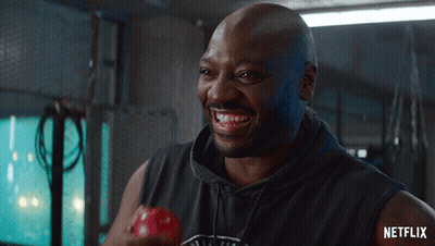 Man In Black Tank Top With Netflix GIF