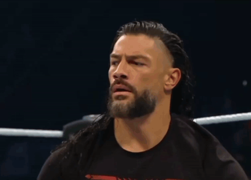 Man In Black Tank Top With Tattoo In Wrestling Ring GIF