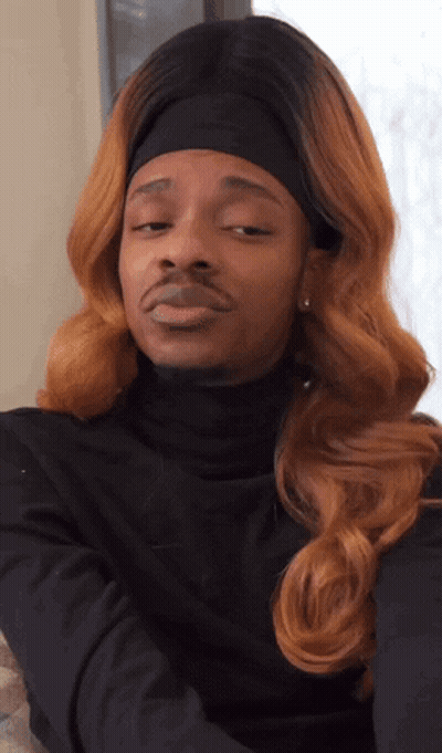 Man in Black Turtleneck and Headband Eyes Closed