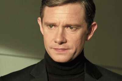 Man In Black Turtleneck And Suit GIF