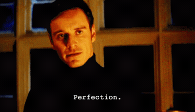 Man In Black Turtleneck With Perfection On Face GIF
