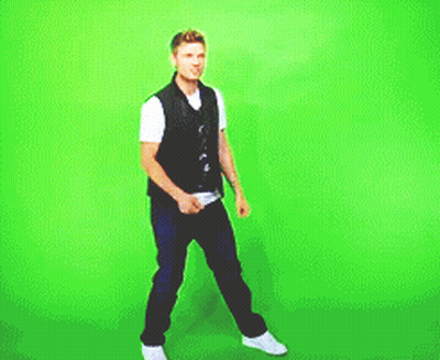 Man In Black Vest And White Shirt Dancing GIF
