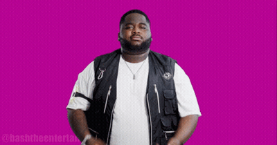 Man In Black Vest And White Shirt On Purple Background GIF
