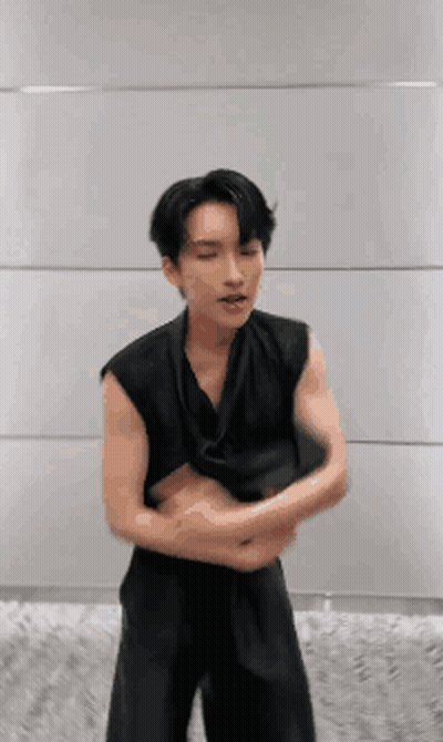 Man In Black Vest With Arms Crossed GIF