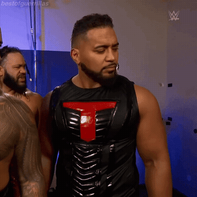 Man In Black Vest With Red T GIF