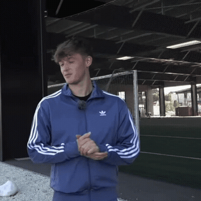 Man In Blue Adidas Jacket At Soccer Goal GIF