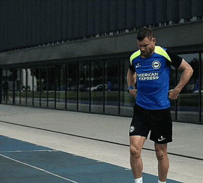 Man In Blue American Express Shirt On Track GIF
