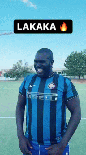 Man In Blue And Black Striped Lakaka Shirt GIF