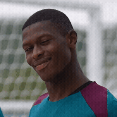 Man In Blue And Purple Smiling Eyes Closed GIF