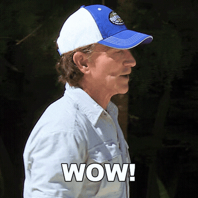 Man In Blue And White Baseball Cap Saying Wow GIF