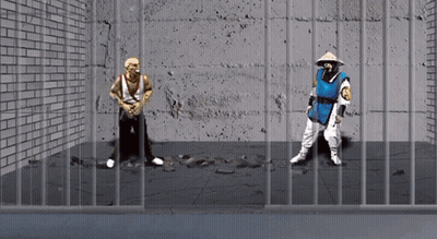 Man In Blue And White Behind Bars GIF