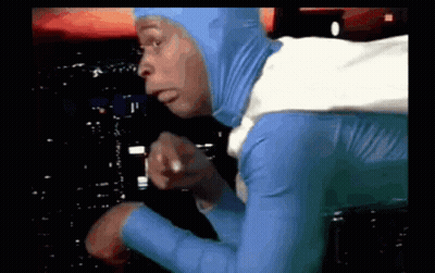 Man In Blue And White Costume Pointing GIF