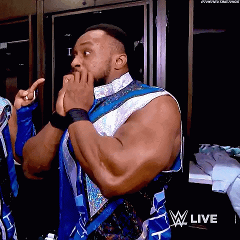 Man In Blue And White Outfit Covering Mouth GIF