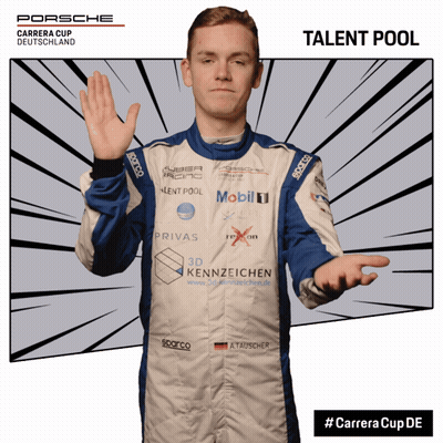 Man In Blue And White Porsche Racing Suit GIF