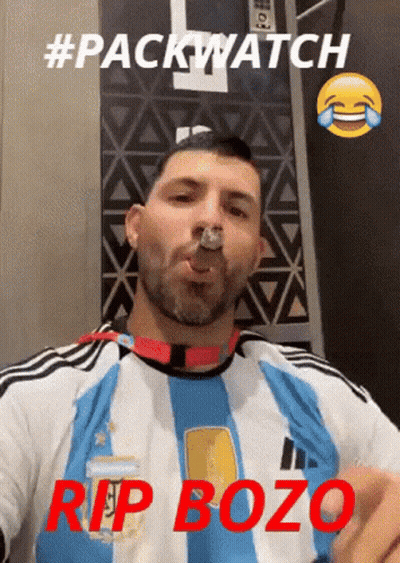 Man In Blue And White Striped Shirt Smoking GIF
