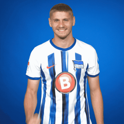 Man In Blue And White Striped Shirt With Letter B GIF