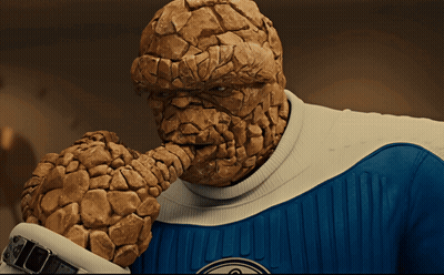 Man In Blue And White Superhero Costume Saying Thing GIF