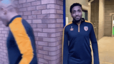 Man In Blue And Yellow Jacket With Number 1 GIF